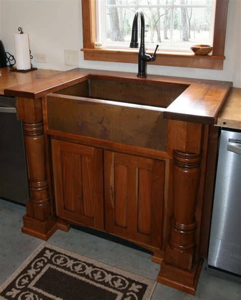 stainless steel or copper sink with cherry cabinets|cherry colored cabinets.